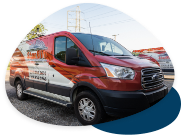 Side view of a Shanklin Heating & Cooling van